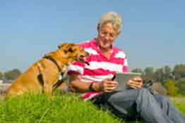 Companion Dog and Senior with Touch Screen Tablet